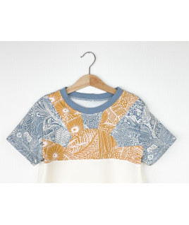 T-shirt Luminous - Variante lumineuse avec découpe en forme de soleil, parfait pour l'été. T-shirt Luminous - Variante lumineuse avec découpe en forme de soleil, parfait pour l'été.