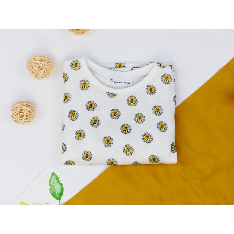 Le pull bio aux motifs de lion