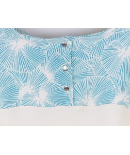 La patte de boutonnage au dos est une jolie finition